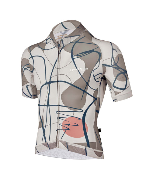 Men's Eclectic Jersey in Sand with abstract design, featuring lightweight fabric and 360 hem for comfort and race fit.