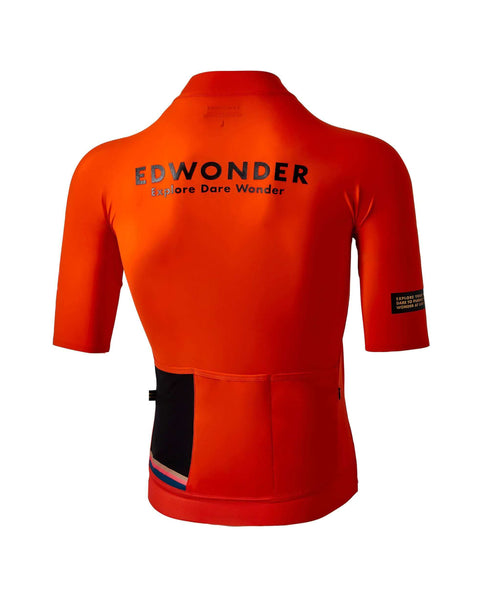 Men's EdW Edition Jersey in Cinnabar Orange, featuring a minimalist design and reinforced pockets for performance.