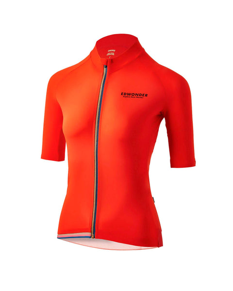 Women's EdW Edition Jersey in Cinnabar Orange, featuring lightweight techno fabric, minimalist design, and race fit.
